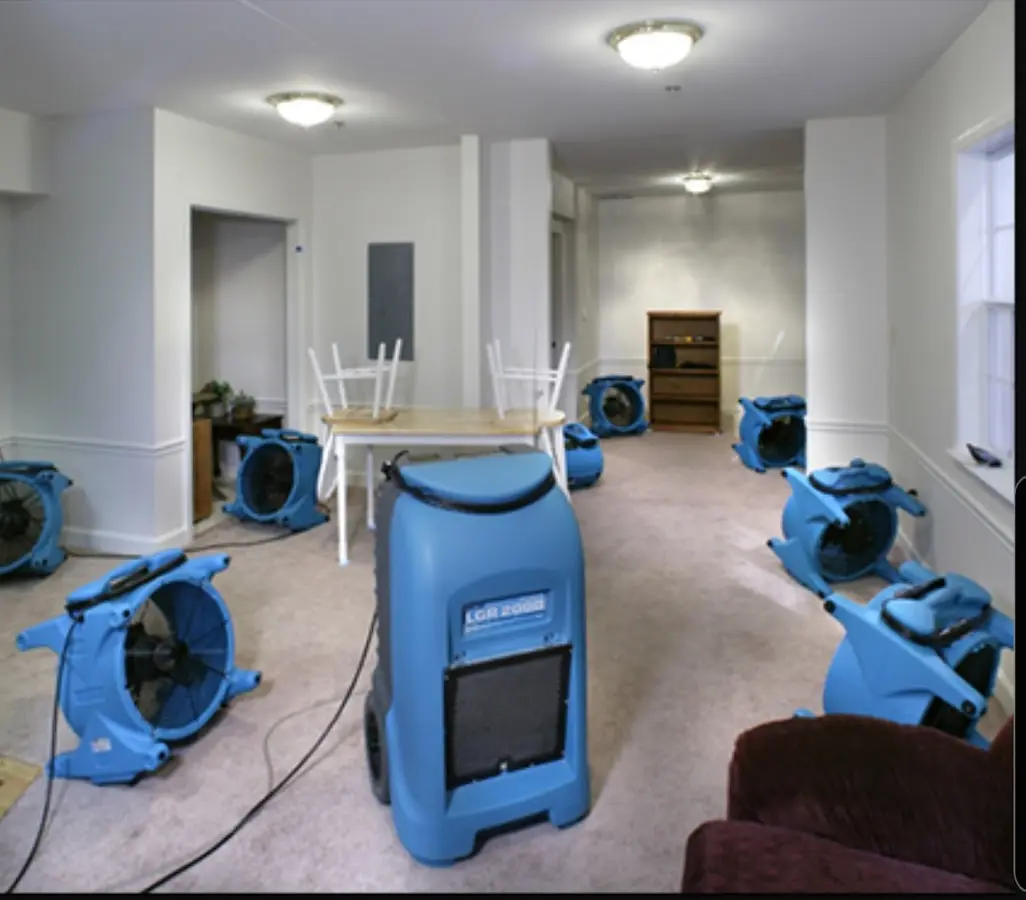 Air movers and dehumidifier setup for Water Extraction & Removal in Delano